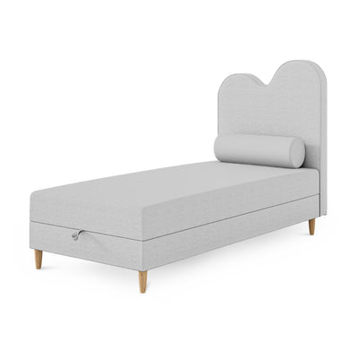 Łóżko dziecięce kontynentalne z falowanym zagłówkiem i pojemnikiem w stylu soft modern | Mellia